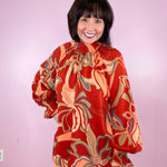 The Most Wonderful Time Of Year Rust Printed Mock Neck Long Sleeve Blouse - Jessi Jayne Boutique