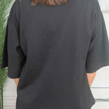 Sleek and Simple Black Mock Neck Short Sleeve Top